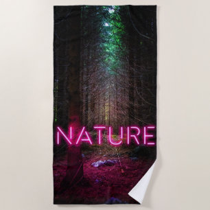 Mysterious spruce forest nature neon magenta sign beach towel