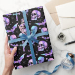 Mystic Skulls Bats & Crosses Wrapping Paper<br><div class="desc">Transform your gifts into eerie delights with Mystic Skulls,  Bats & Crosses Wrapping Paper. Featuring a mystical design of skulls,  bats,  and crosses on a dark background,  perfect for a spooky surprise.</div>