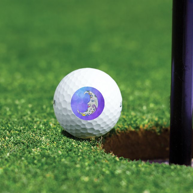 Mystical Crescent Moon Face Pretty Markings Purple Golf Balls (Mystical white crescent moon decorations and face on purple sky background golf balls.)