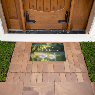 Mystical Swans Gracefully Gliding On Summer Pond Doormat