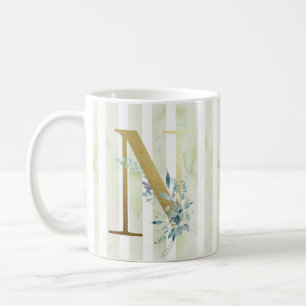 N golden initial on blue and white stripes coffee mug