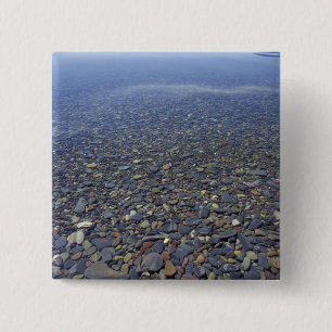 NA, USA, Montana, Glacier NP Rocks in Lake 15 Cm Square Badge