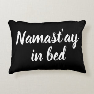 Namastay in bed brush script lettering funny black decorative cushion