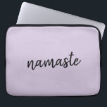 Namaste | Lilac Purple Stylish Yoga Meditation Zen Laptop Sleeve<br><div class="desc">Simple, stylish "namaste" quote art design in modern minimalist handwritten script typography on a pastel lavender lilac purple background. The slogan can easily be personalised with your own words for a perfect gift for a yoga bunny or pilates lover! Namasté literally means "greetings to you." In the Vedas, namaste mostly...</div>