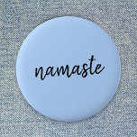 Namasté | Pastel Blue Yoga Spiritual Salutation 6 Cm Round Badge<br><div class="desc">Simple, stylish "namaste" quote art design in modern minimalist handwritten script typography on a pastel blue background. The slogan can easily be personalized with your own words for a perfect gift for a yoga bunny or pilates lover! Namasté literally means "greetings to you." In the Vedas, namaste mostly occurs as...</div>