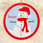 Name Personalised Christmas Snowman Ornament<br><div class="desc">This name personalised Christmas snowman ornament features an adorable little snowman wearing a red Santa hat, red muffler and red buttons on a winter day with snow falling in the background. The snowman scene has a coordinating red border. You may personalise the name ornament with your name or the name...</div>