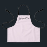 Name Simple Chic Elegant script Name Apron<br><div class="desc">Your little helper will love a cute apron with an elegant and modern script as she bakes those goodies,  cooks delicious dishes or work with her plants. A perfect gift to encourage her talents. Black script for the name with long-tail embellishments.</div>