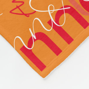 Name Stamped in Red all-over Orange Colour Fleece Blanket