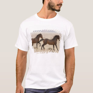 Namibia, Aus. Wild horses running on the Namib T-Shirt