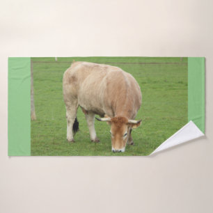 Nantaise cow in a field bath towel