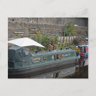 Narrow boat and flower garden postcard