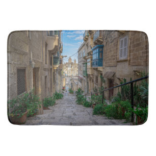 Narrow stone street in Malta Bath Mat