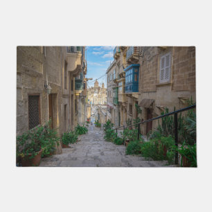Narrow stone street in Malta Doormat