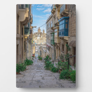 Narrow stone street in Malta Plaque