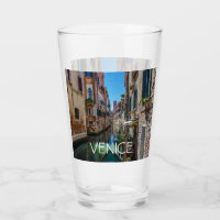 Narrow street with canal in Venice