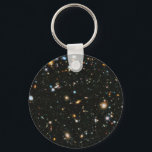NASA Hubble Ultra Deep Field Galaxies Key Ring<br><div class="desc">Astronomers using NASA's Hubble Space Telescope have assembled the most colorful deep space images ever captured. Combining the full range of colors available to Hubble, stretching all the way from ultraviolet to near-infrared light, the resulting image -- made from 841 orbits of telescope viewing time -- contains approximately 10, 000...</div>