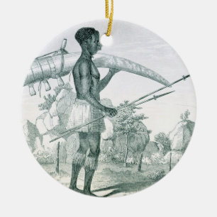 Native carrying a decorated ivory elephant tusk, f ceramic tree decoration