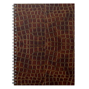 Natural background of lacquered brown crocodile le notebook