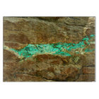 Natural turquoise vein in rough brown stone