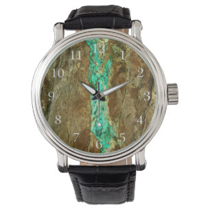Natural turquoise vein in rough brown stone watch