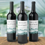 Nature Mountain Pine Trees Personalised Wine Label<br><div class="desc">Personalised wine labels are perfect for adding a unique custom touch to your table wine, wedding favours or welcome gifts. Classy elegant design for fall or winder weddings features watercolor mountain with pine trees. your names, wedding date and wine varietal or custom message in elegant lettering. Designed to coordinate with...</div>