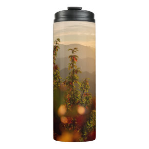 Nature photography of green trees overlooking moun thermal tumbler