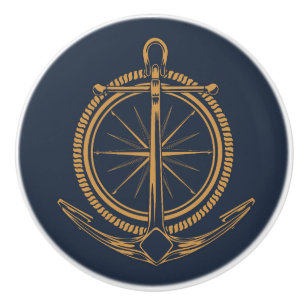 Nautical design with gold compass and anchor ceramic knob
