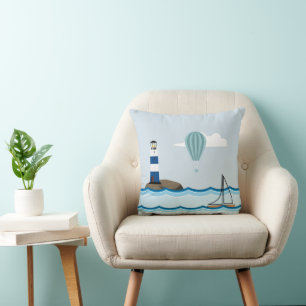 Nautical Scene with Lighthouse and Sailboat Cushion