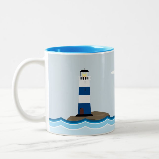 Nautical Scene with Lighthouse and Sailboat Two-Tone Coffee Mug (Left)