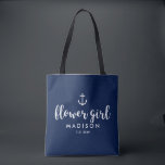 Nautical Wedding White Anchor Custom Flower Girl Tote Bag<br><div class="desc">Surprise your Flower Girl with this personalised tote bag featuring a nautical design with a white anchor set against a navy background. Customise by adding her name and your wedding date. A great size for wedding essentials: extra clothing, shoes, snacks, water, etc. The perfect go-to bag for a nautical, beach...</div>