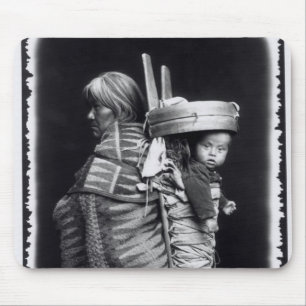 Navaho woman carrying a papoose on her back mouse mat