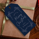 Navy Blue Bow Whimsical Unique Christmas Gift Gift Tags<br><div class="desc">Create unique holiday gift tags with this Whimsical Christmas Gift Tag Design. Featuring hand drawn bows and ribbons illustrations,  modern layout,  handwritten calligraphy fonts in a festive navy blue & white aesthetic. These holiday gift tags are the perfect finishing touch to your gift wrapping this season.</div>