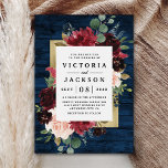 Navy Blue Burgundy Blush Pink Gold Rustic Wedding Invitation<br><div class="desc">Design features a dark navy blue barn wood grain plank background decorated with an elegant floral wreath of peony rose flowers, eucalyptus greenery and more in shades of burgundy, Marsala red, maroon, blush pink etc. Design also features a printed gold colored border underneath the floral wreath for a modern look....</div>