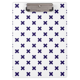 Navy blue cross stitches on white clipboard