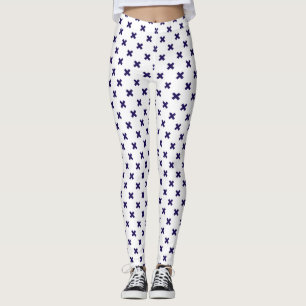 Navy blue cross stitches on white leggings