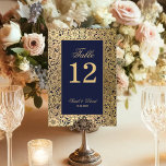 Navy Blue Elegant Vintage Gold Roses Wedding Table Number<br><div class="desc">This blue, elegant wedding table number, with a vintage air, has a vintage golden frame with gold wild roses decorations on a navy blue background. The names and the title Table are written in an elegant calligraphic script. All text can be personalised and has a golden colour similar to the...</div>