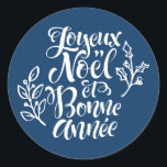 Navy Blue Joyeux Noël and Bonne Année Christmas Classic Round Sticker<br><div class="desc">Add a festive French touch to your holiday gifts and cards with this sticker featuring “Joyeux Noël et Bonne Année” in modern calligraphy accented by holly illustrations. Perfect for decorating presents,  planners,  and holiday crafts,  this sticker brings elegance and seasonal cheer to any project.</div>