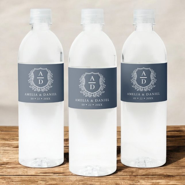 Navy Blue Monogram Botanical Wedding Floral Crest Water Bottle Label (Creator Uploaded)