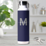 Navy Blue Name Monogram Water Bottle<br><div class="desc">Create Your Own Personalised Navy Blue Initial Script Name Monogram Water Bottle. This stylish and modern water bottle features a deep navy blue background for a sleek and versatile look. A soft grey initial sits in the centre with a clean, flat finish, while a white flowing script name overlays the...</div>
