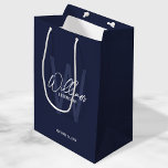Navy Blue Script Personalised Groomsmen Medium Gift Bag<br><div class="desc">Modern Minimalist Personalised Monogram and Name Gifts This design features personalised name in white modern handwriting script font style and monogram in light navy blue modern sans serif font style as background, with wedding details in white modern sans serif font style, on navy blue background. Also perfect for best man,...</div>