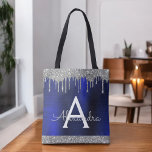 Navy Blue Silver Glitter Sparkle Elegant Monogram Tote Bag<br><div class="desc">Luxury Silver and Navy Blue Faux Sparkle and Glitter Elegant Monogram Book Bag. This Book Bag can be customised to include your initial and first name and given as a gift for Christmas,  Sweet 16 Birthday,  Bridal Shower or a Wedding.</div>