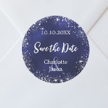 Navy blue silver wedding Save the Date Classic Round Sticker<br><div class="desc">A Save the Date sticker for your wedding. A navy blue background,  white text. The blue colour is uneven. Decorated with faux silver sparkles. Personalise and add your names and wedding date.</div>