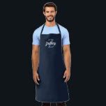 Navy Blue White Monogram Personalised Apron<br><div class="desc">This personalised apron features a greyish blue monogram initial and white retro script name on a dark navy blue background. It makes a great Father's Day gift for the man who loves to grill or cook!</div>