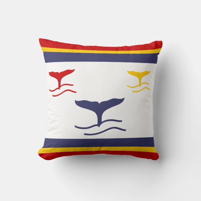 navy blue, yellow, and red whale tails on white cushion (Front)