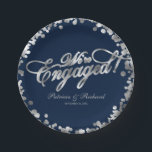 Navy Silver We're Engaged Engagement Party Paper Plate<br><div class="desc">Elegant calligraphy engagement party paper plate. Easy to personalise with your details. Please get in touch with me via chat if you have questions about the artwork or need customisation. PLEASE NOTE: For assistance on orders,  shipping,  product information,  etc.,  contact Zazzle Customer Care directly https://help.zazzle.com/hc/en-us/articles/221463567-How-Do-I-Contact-Zazzle-Customer-Support-.</div>
