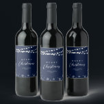 Navy & White String Lights Snow Merry Christmas Wine Label<br><div class="desc">Celebrate the season with this stylish custom Christmas wine label. This label design features "Merry Christmas" text and a festive snowflake and string lights background. You can personalise the text. More holiday stationery and party supplies are available at my shop BaraBomDesign.</div>