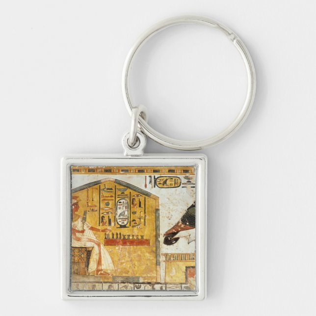 Nefertari playing senet key ring (Front)
