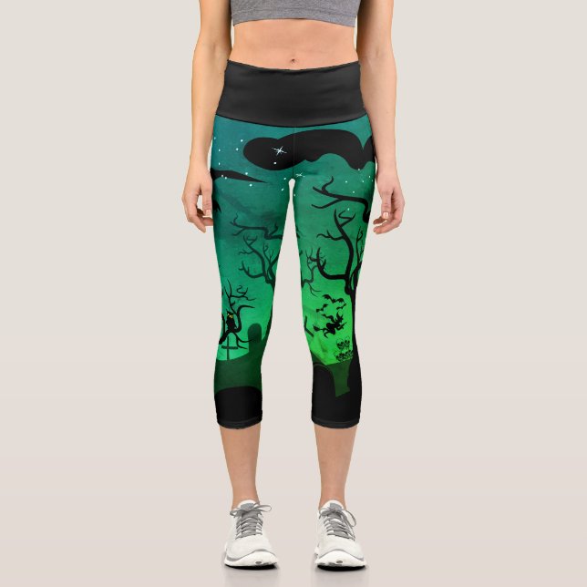 Neon green and black haunted graveyard Halloween Capri Leggings (Front)