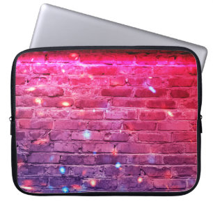 Neon light: empty brick wall. laptop sleeve