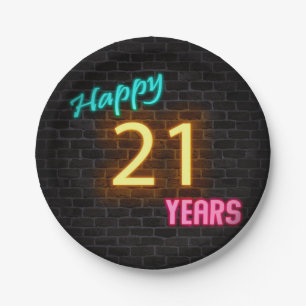 Neon number 21 sign on brick wall paper plate